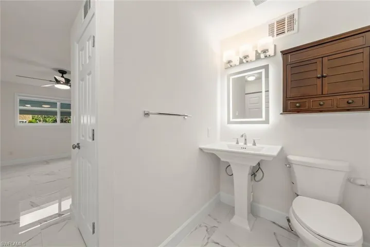 Half bath off primary bedroom