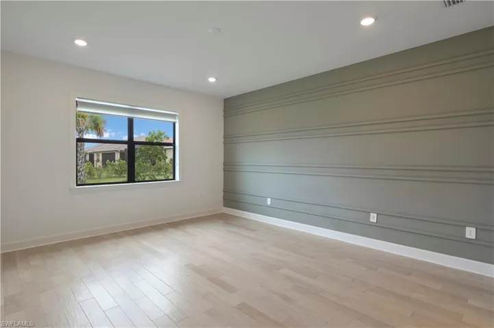 Primary room featuring hardwood floors