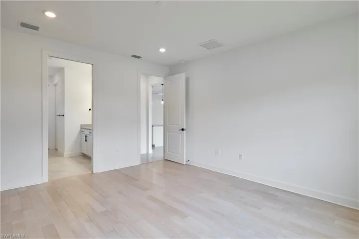 Primary room featuring hardwood floors