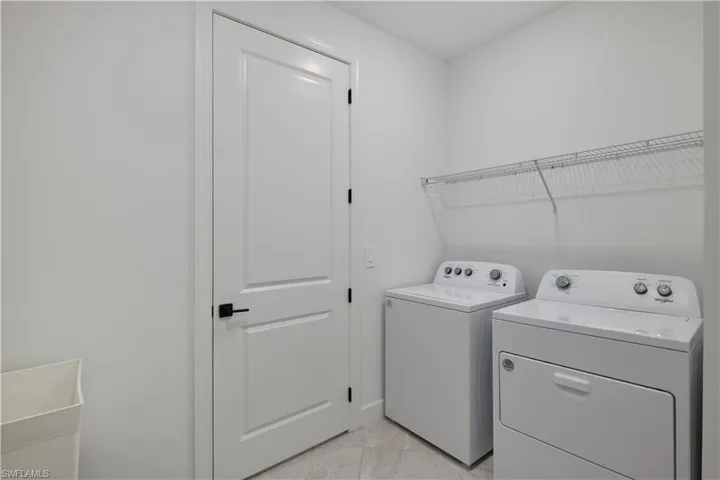 Laundry room with separate washer and dryer