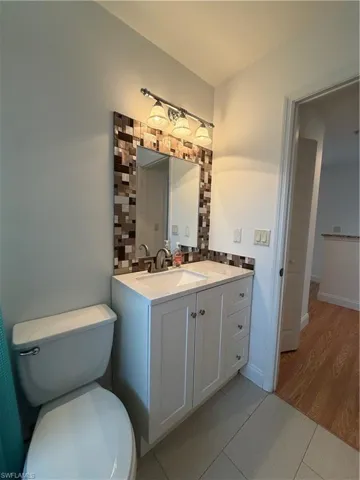 Bathroom featuring vanity and light tile patterned floors