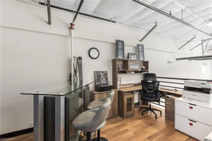 Office space with light wood finished floors