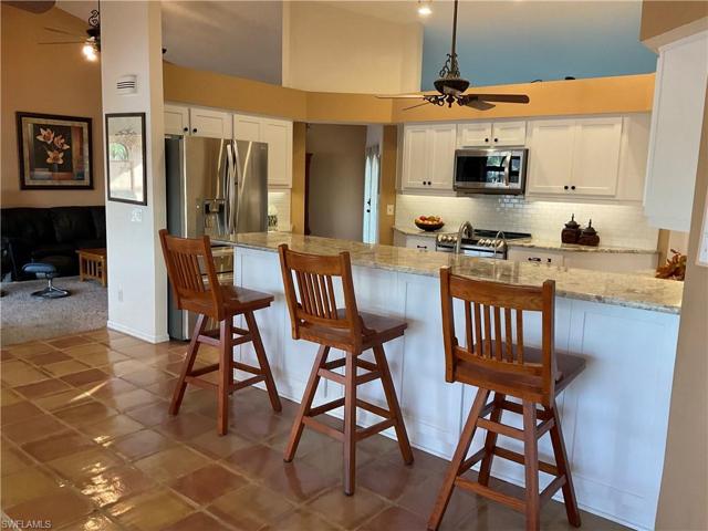 Cabinet storage behind breakfast bar