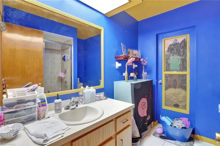 Bathroom with tile floors and large vanity
