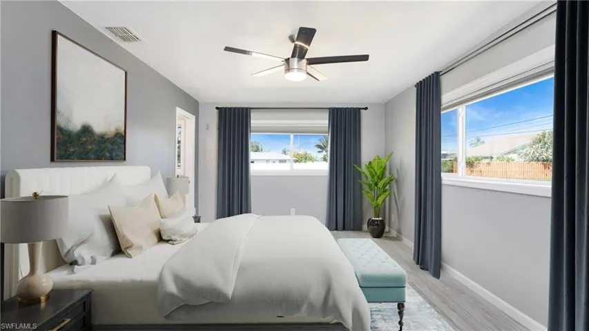 Photo includes reality staging to showcase the possibility of the primary bedroom. Design services included with purchase!
