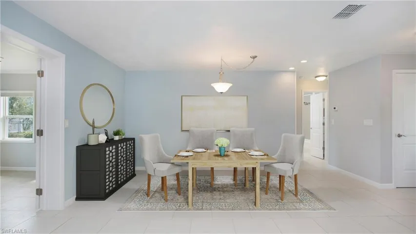 Photo includes reality staging to showcase the possibility of the dining room. Design services included with purchase!