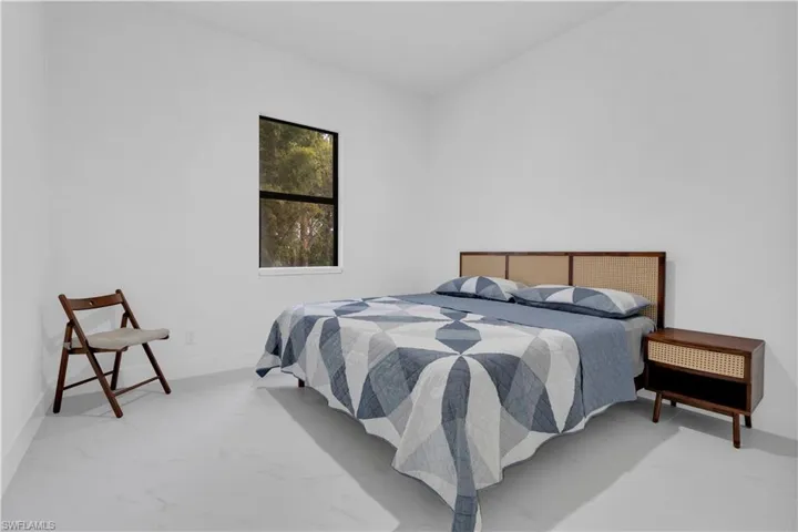 Bedroom featuring baseboards