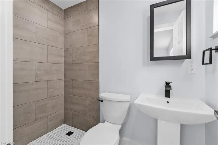 Bathroom featuring toilet and a sink