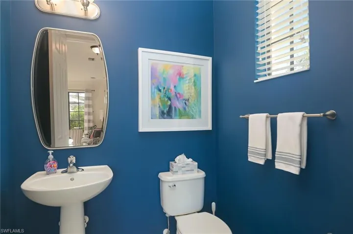 Bathroom with sink and toilet