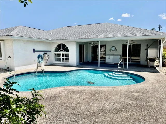 Pool featuring a patio and a ceiling fan