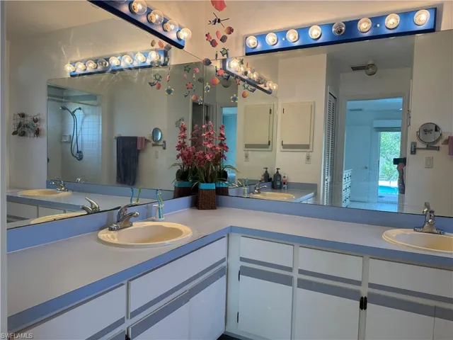 Main bathroom with double vanities