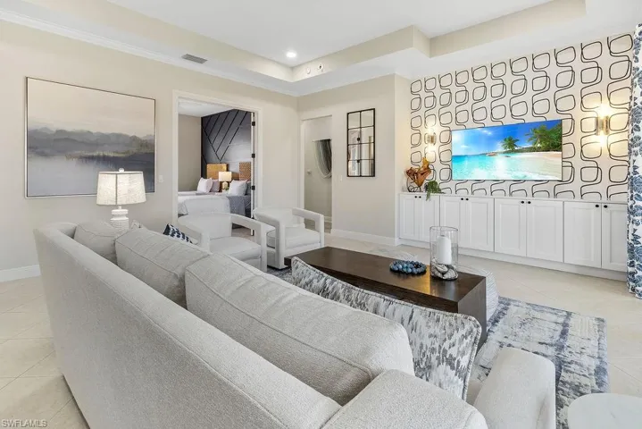 Designer details everywhere you look - custom wallpaper, sconces and plenty of storage