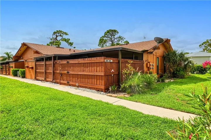 View of front of property with a front lawn