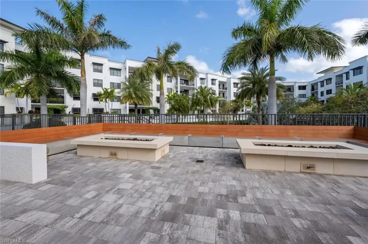 Outdoor fire pit lounge perfect for evenings under the stars.