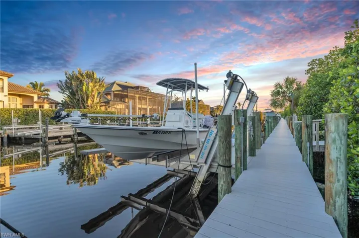 View of dock with a water view