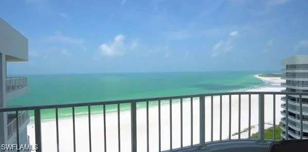 Property view of water with a beach view