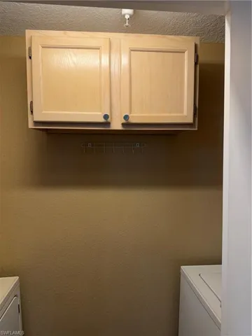 Laundry area featuring washer / dryer