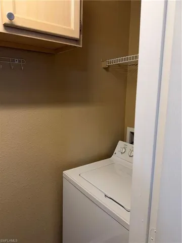 Laundry area featuring washer / dryer