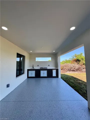 View of patio / terrace with area for grilling and a sink