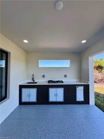 View of patio / terrace with a sink
