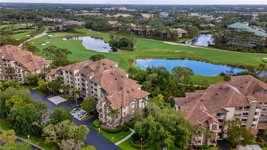 Overhead look at Wedgewood buildings and peaceful lake views within Bonita Bay.