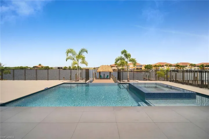 infinity pool, gulf access, boat lift and dock