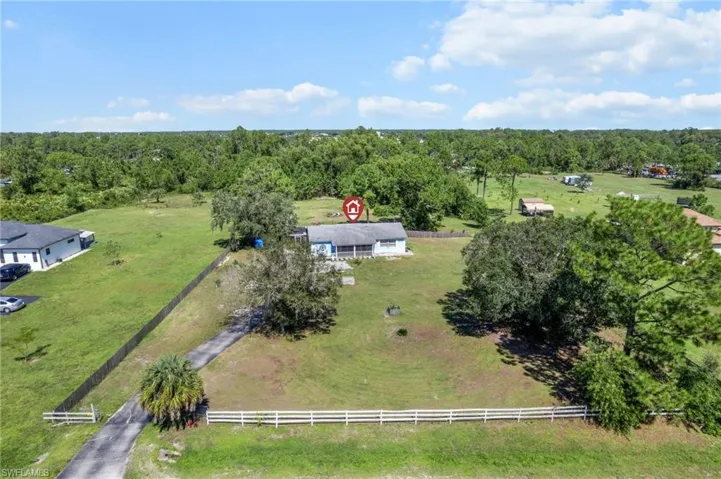 Aerial view of sparsely populated area with a pastoral area