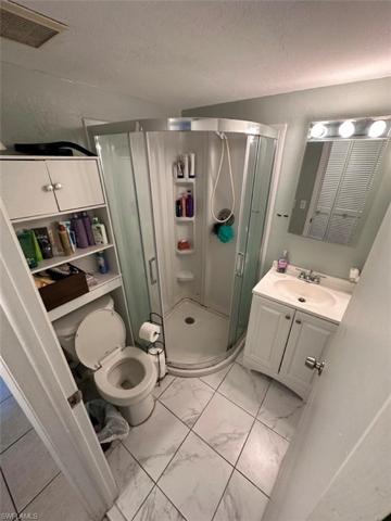 Guest Bathroom from entry, showing standing shower