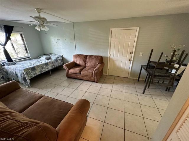 View of Living Room from hallway - Showing Front Door
