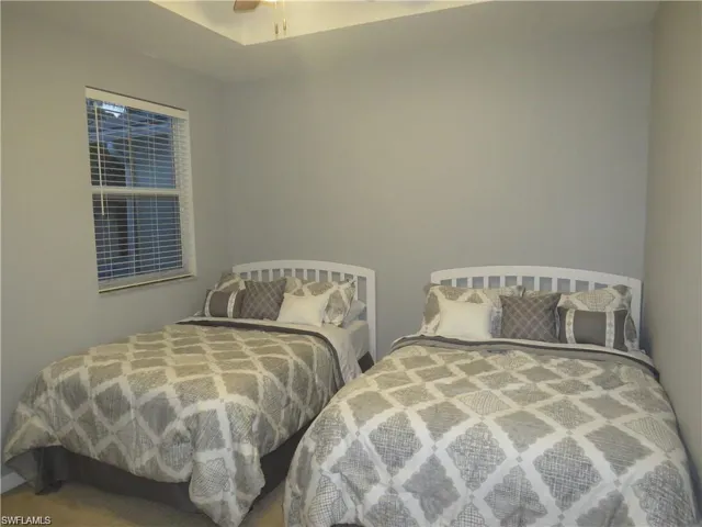 Bedroom featuring a ceiling fan