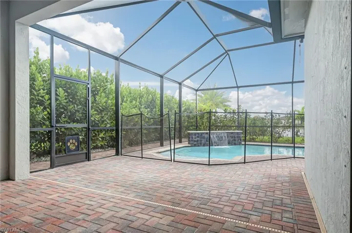 Outdoor pool featuring a patio area