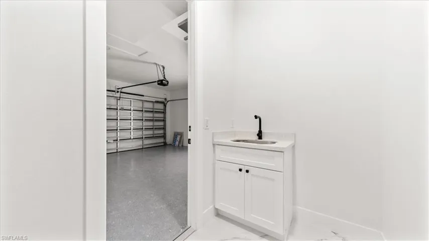Walk in closet featuring a sink