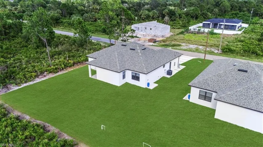 Aerial view of property and surrounding area