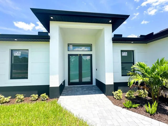 Entrance to property featuring french doors