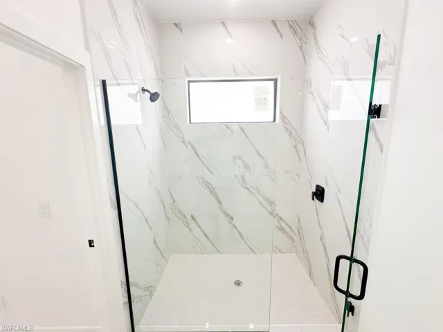 Bathroom with an enclosed shower