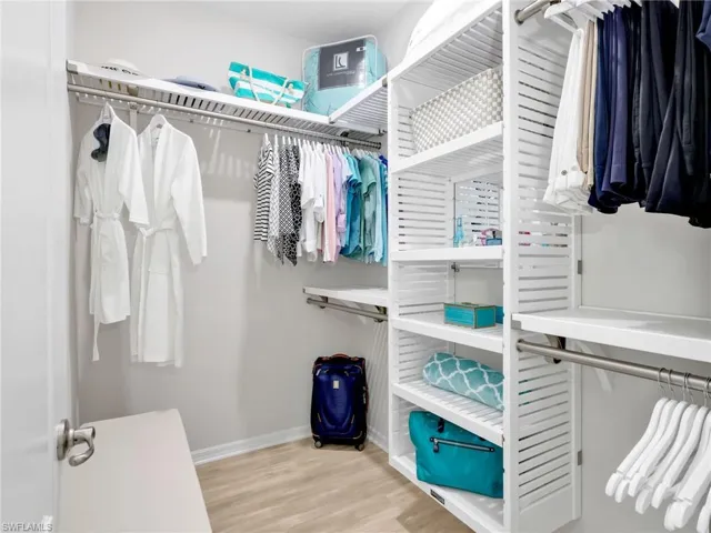 2 Large Walk-In Closets with Closet Organizers