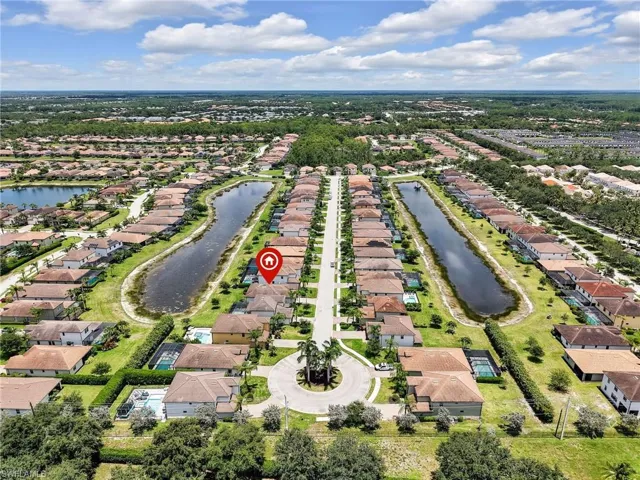 Aerial View of the Home with Lake View