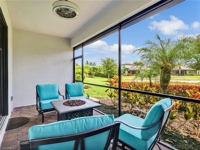 Screened In Lanai with Lake View, Paver Flooring, AHT Electric Screen, & Upgraded Landscaping