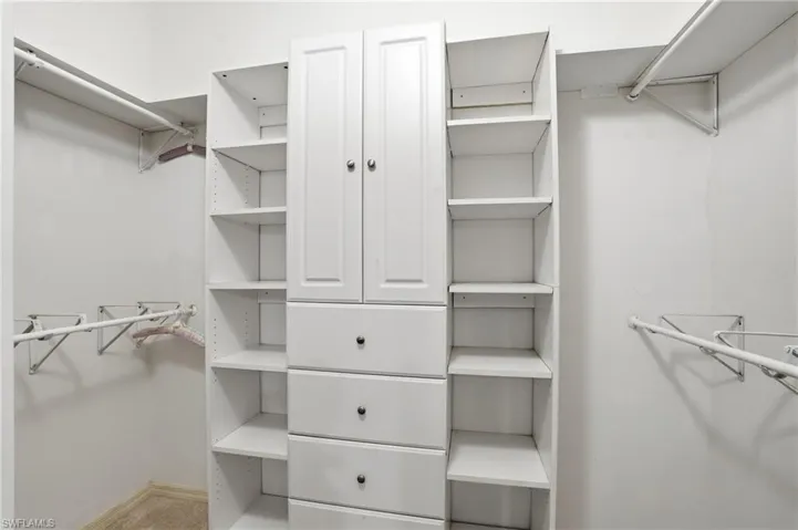 View of walk in closet - Virtually Edited Image