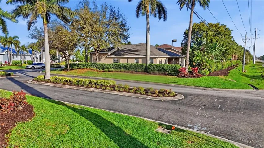 View of asphalt road featuring curbs - Virtually Edited Image