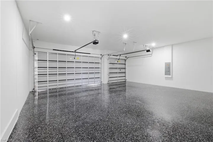 Garage featuring electric panel
