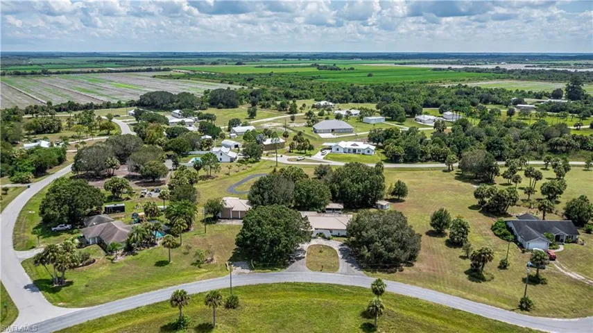 Birds eye view of property featuring a rural view