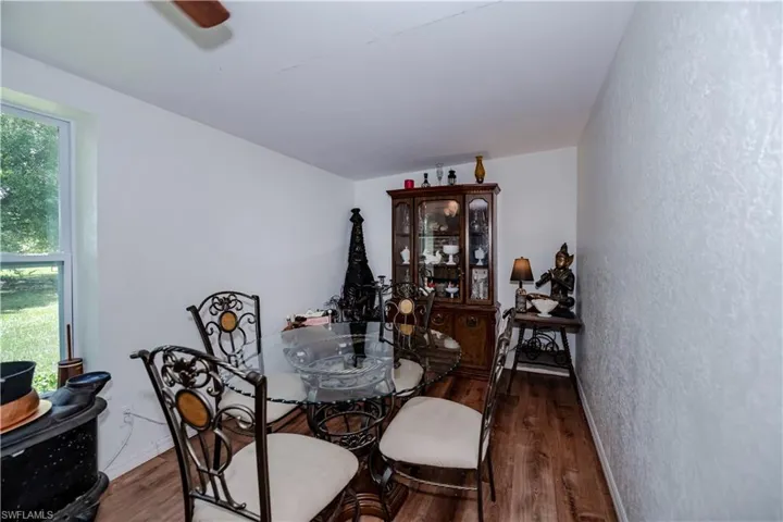 Dining area featuring dark hardwood / wood-style flooring