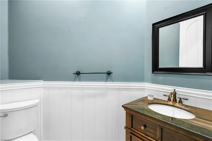 Bathroom with vanity and toilet