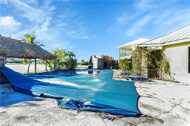 View of swimming pool featuring a gazebo