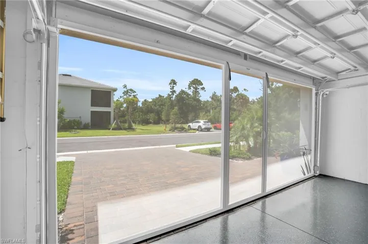 Looking out through Garage Screen Door