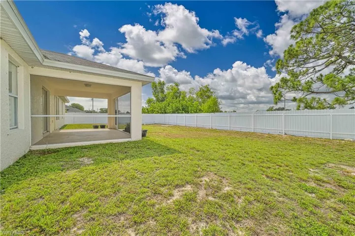 View of yard with a patio area