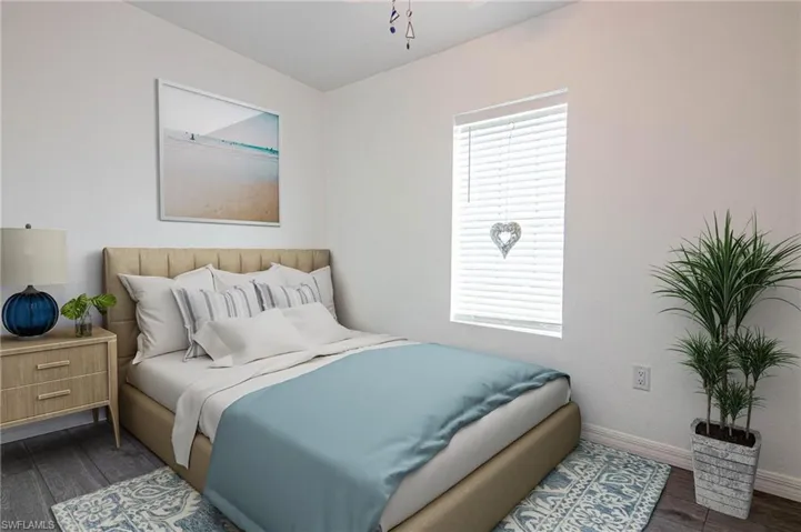 BEDROOM #3 - NEW LUXURY VINYL PLANK FLOORING THROUGHOUT. CUSTOM CLOSET SHELVING. CLOSET IS OPEN FROM WALL TO WALL INSIDE.