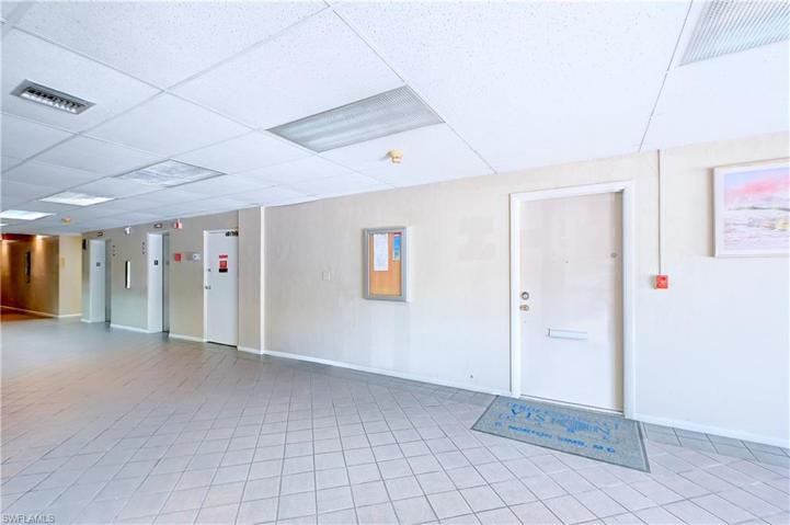 Office back door or entry to Unit 107