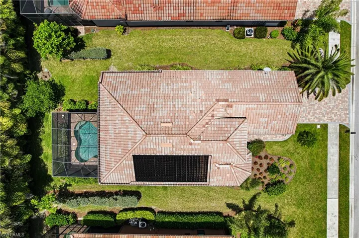 Bird’s-eye view highlighting the home and outdoor living space